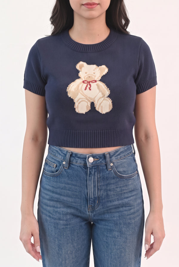 Front fit of the navy teddy bear sweater top in Small with its cropped ribbed hem.