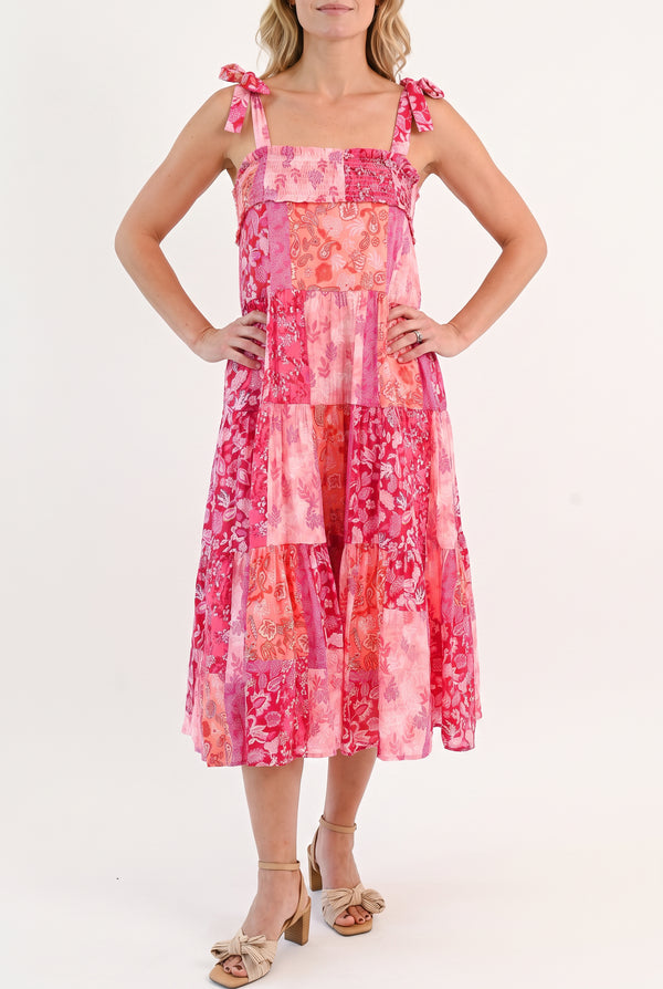 Front fit of the pink patchwork shoulder-tie midi dress in size Small