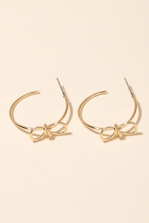 Harley Bow Tie Hoop Earrings, Still life