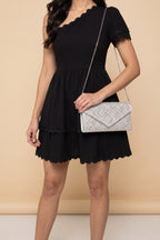 Silver Gemma rhinestone envelope clutch, front view.