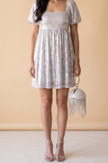 Front view of the Lola pearl rhinestone fringe ball bag.