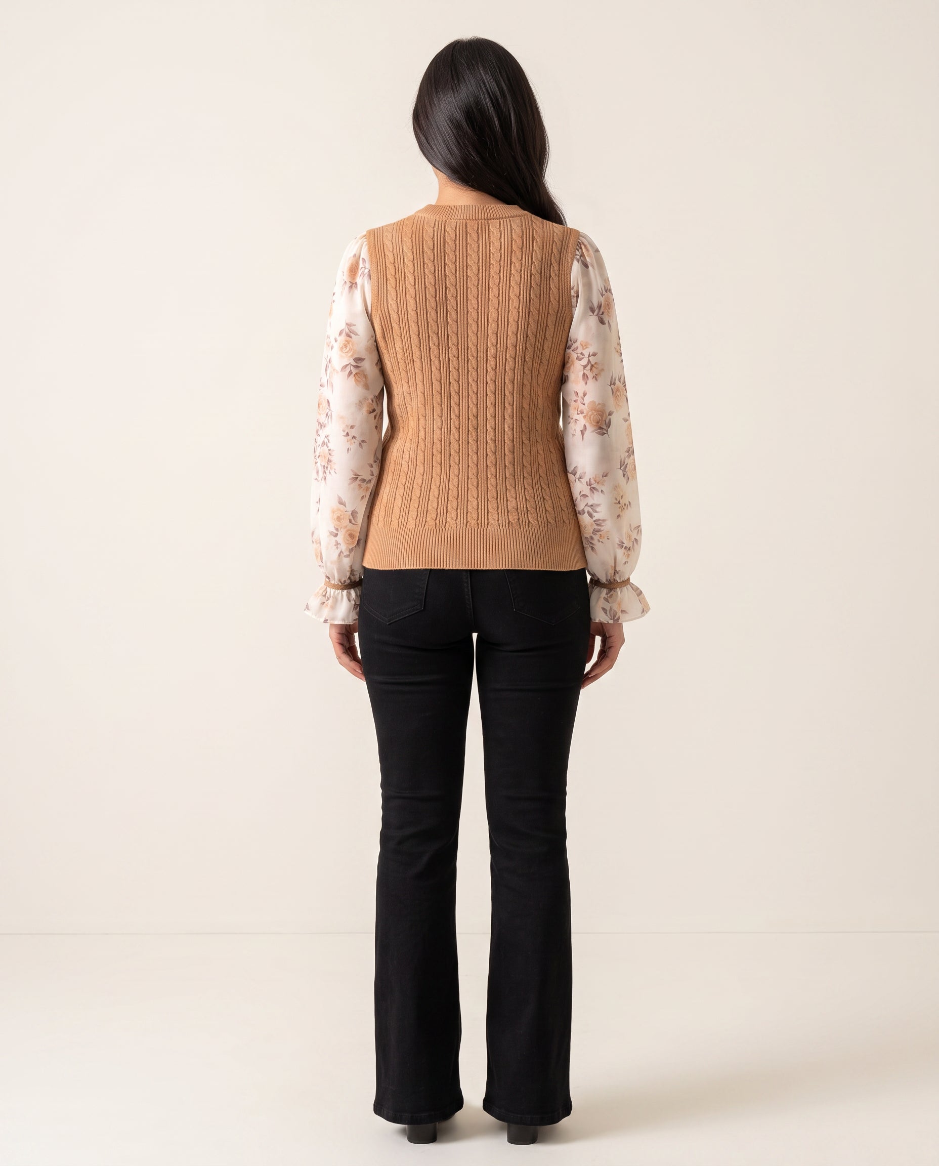 Back fit of the Tan cable-knit sweater top showing its rear pattern, shoulders and upper-hip hem.
