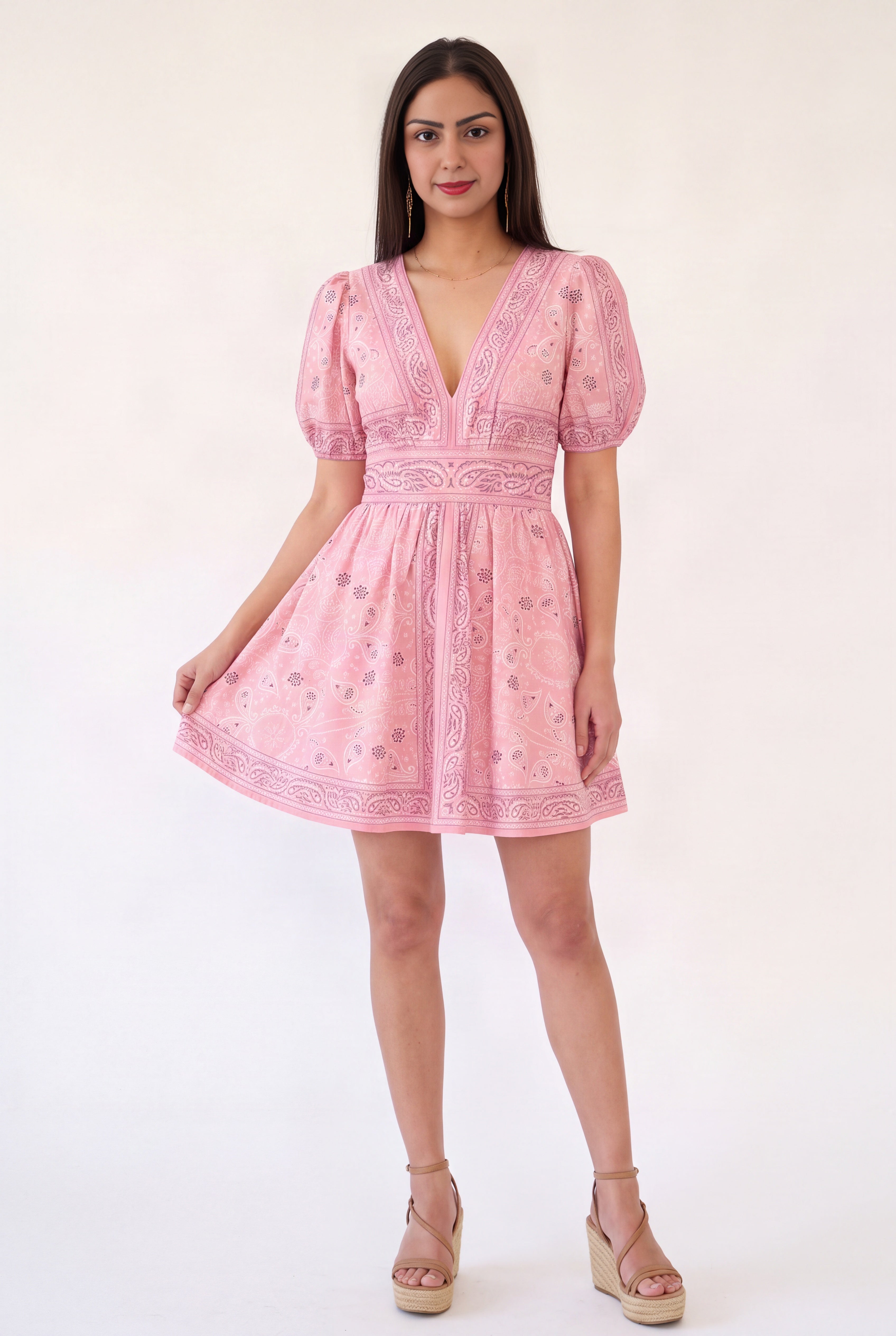 Close view of the Forget Me Not Paisley Dress showing the cotton drape, neckline and border print.