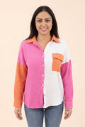 Front view of the Pink Just Chilling boyfriend shirt on Shweta, showing its oversized color-block fit.