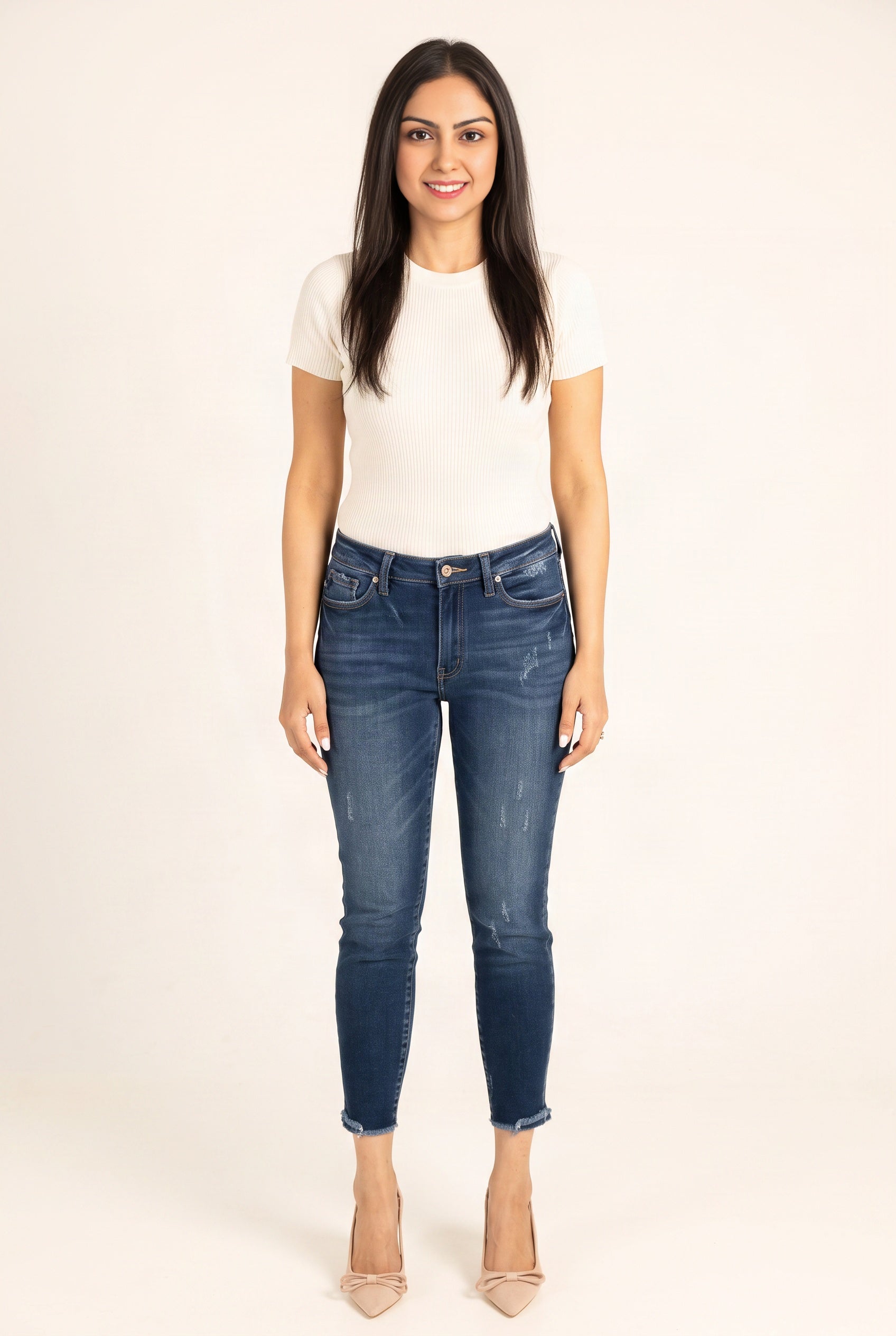 Beautiful Day Mid Rise Ankle Jeans showing the full skinny silhouette and cropped frayed hems.