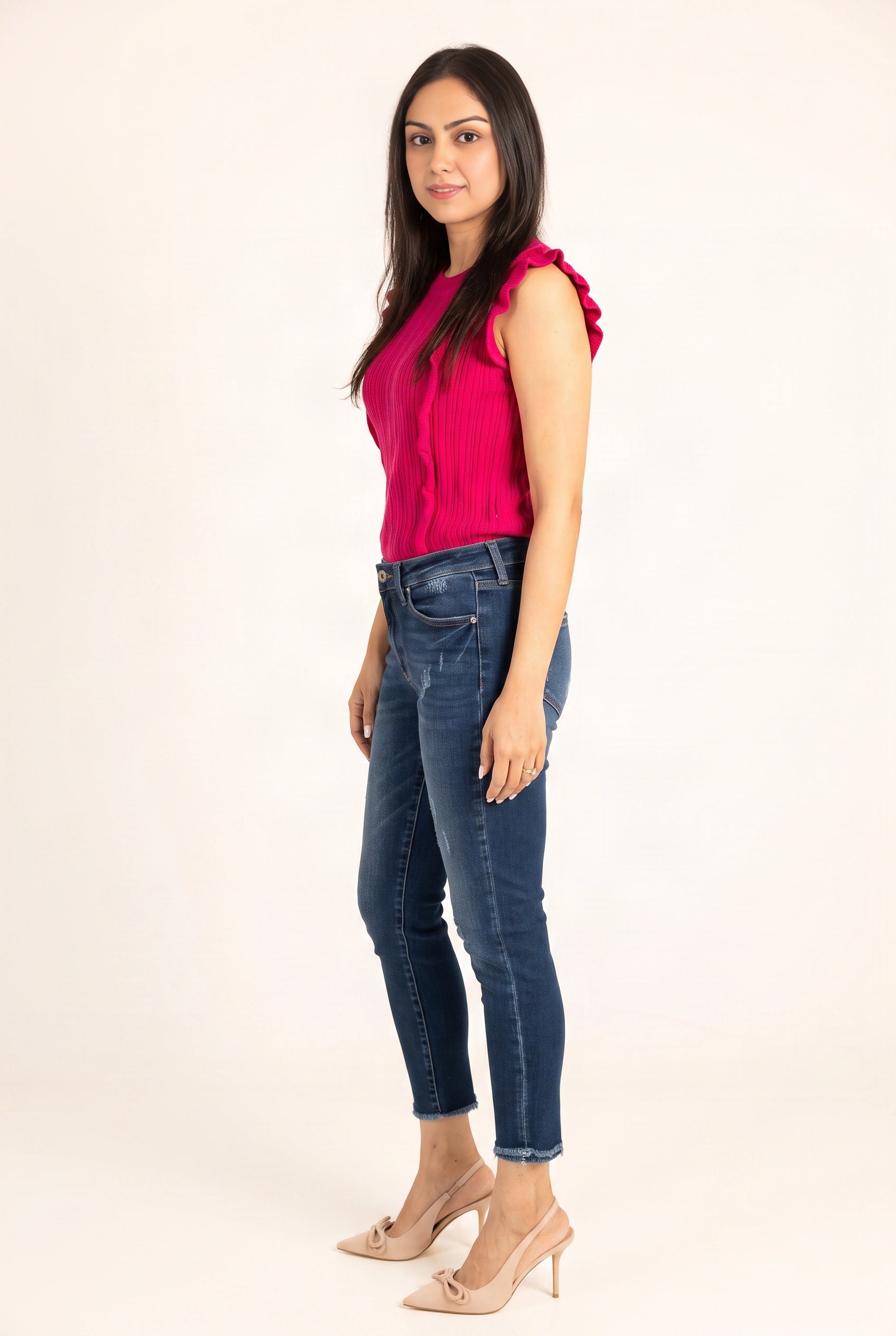 Side fit of Beautiful Day Mid Rise Ankle Jeans showing the close leg and cropped ankle length.