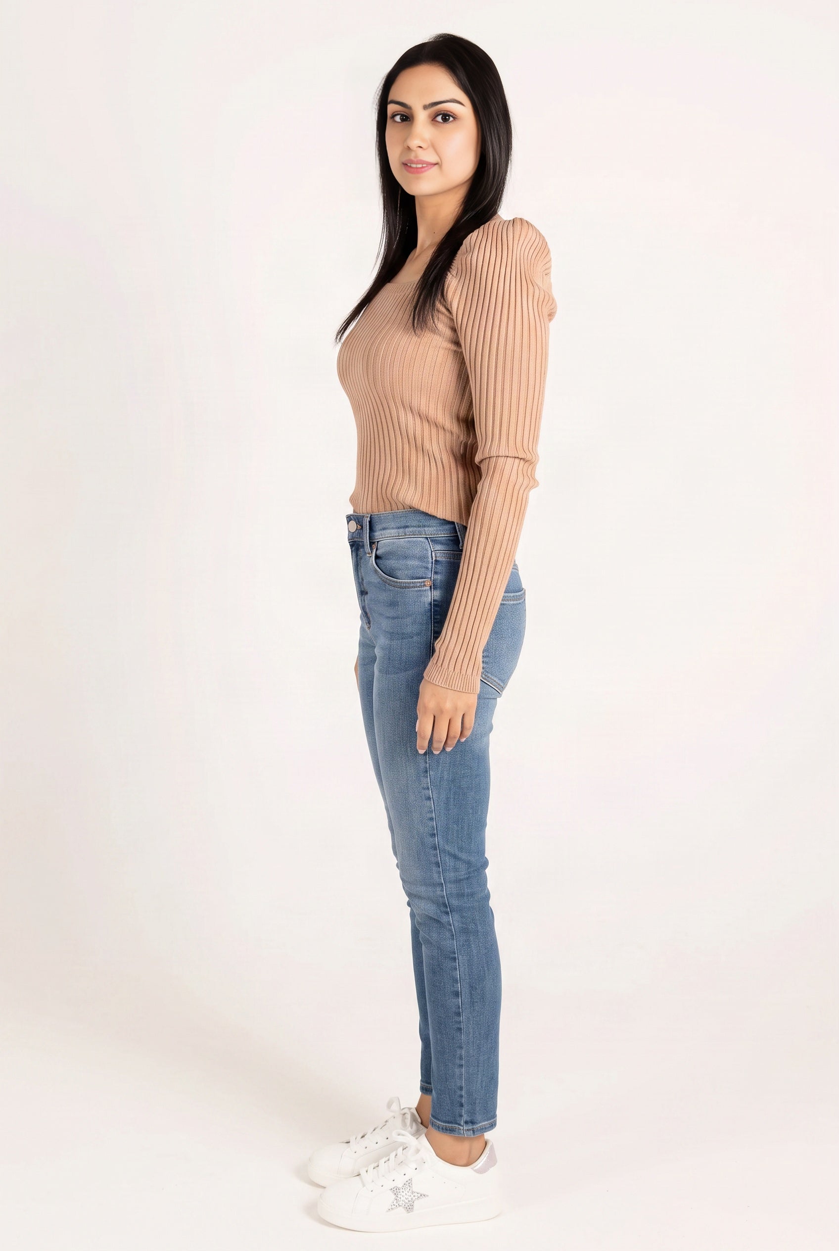 Side fit of Bold Adventures skinny jeans showing the waistband, fitted seat and tapered leg.