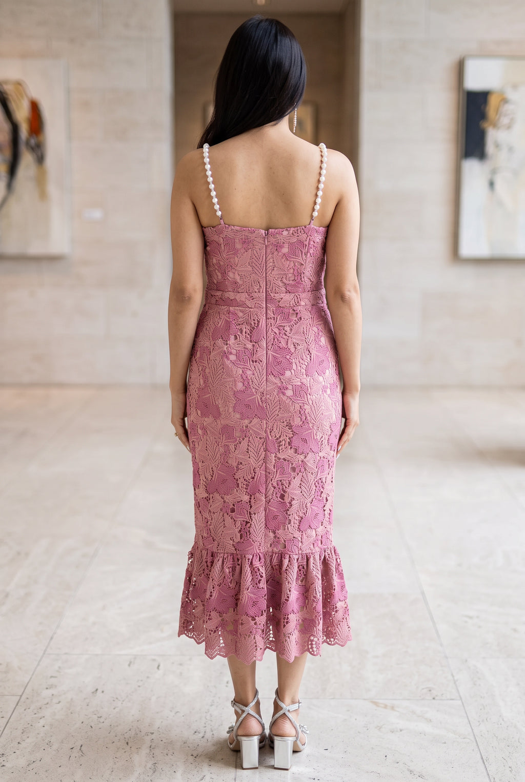 Back view of the Medium pink pearl-trim mermaid dress showing the low back and center zipper.