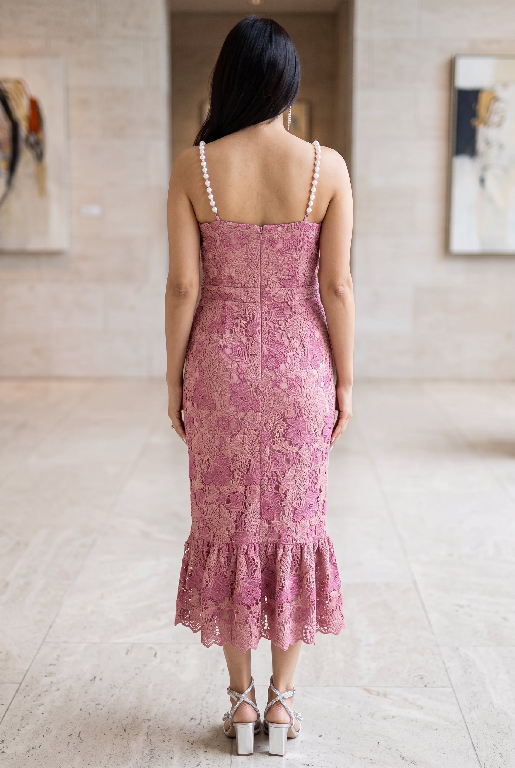 Back view of the Medium pink pearl-trim mermaid dress showing the low back and center zipper.