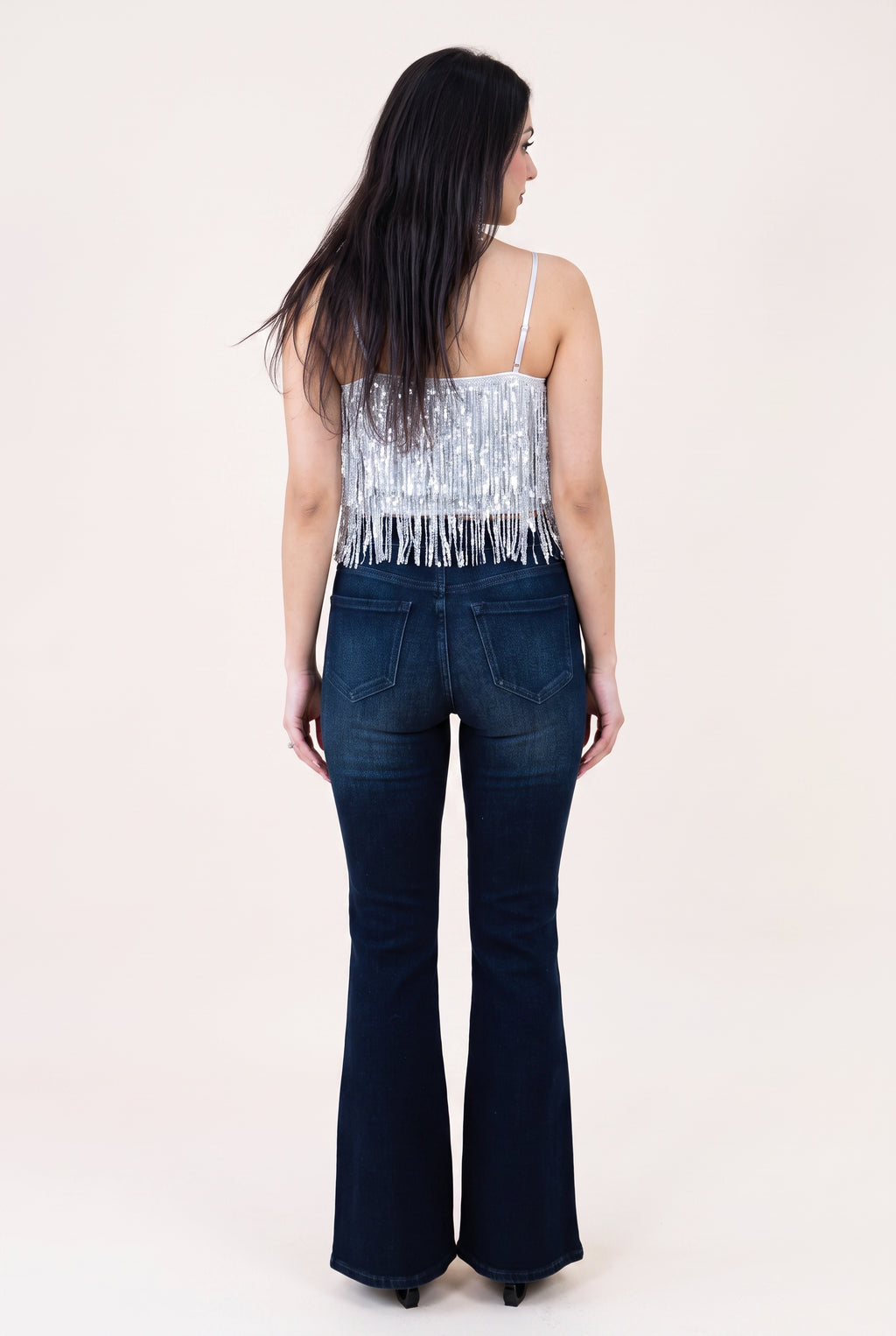 Back fit of the Always on My Mind flare jeans showing the high waist, shaped yoke and patch pockets.