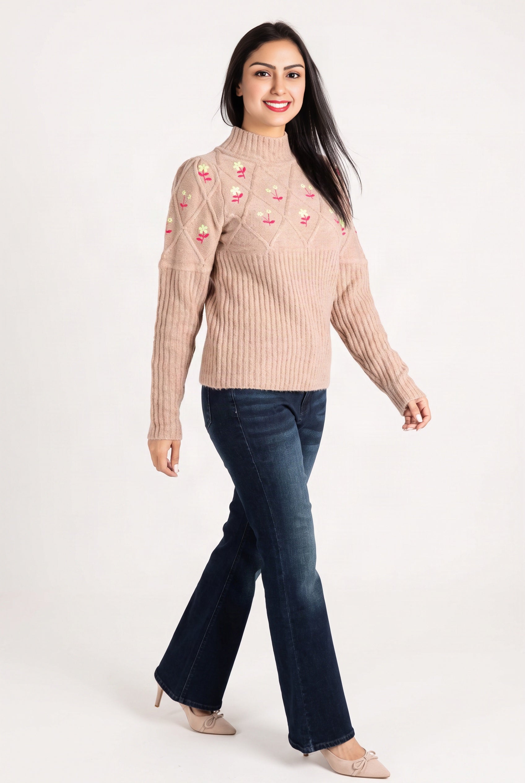 Happy Times Floral Sweater in motion, showing the fuller upper sleeve and fitted ribbed forearm.