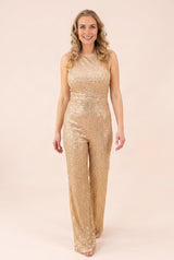 Front view of the My Chance To Dance gold sequin jumpsuit showing its fitted waist and wide legs.