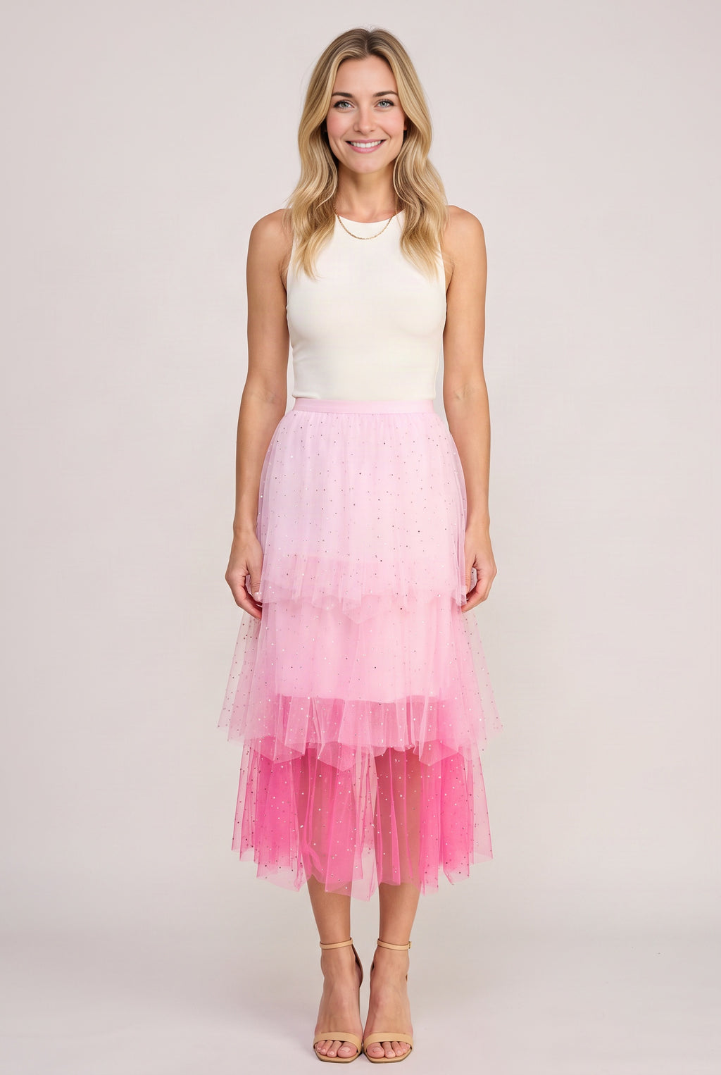 Front view of the Heart Over Mind pink tiered tulle midi skirt showing its full tonal silhouette.
