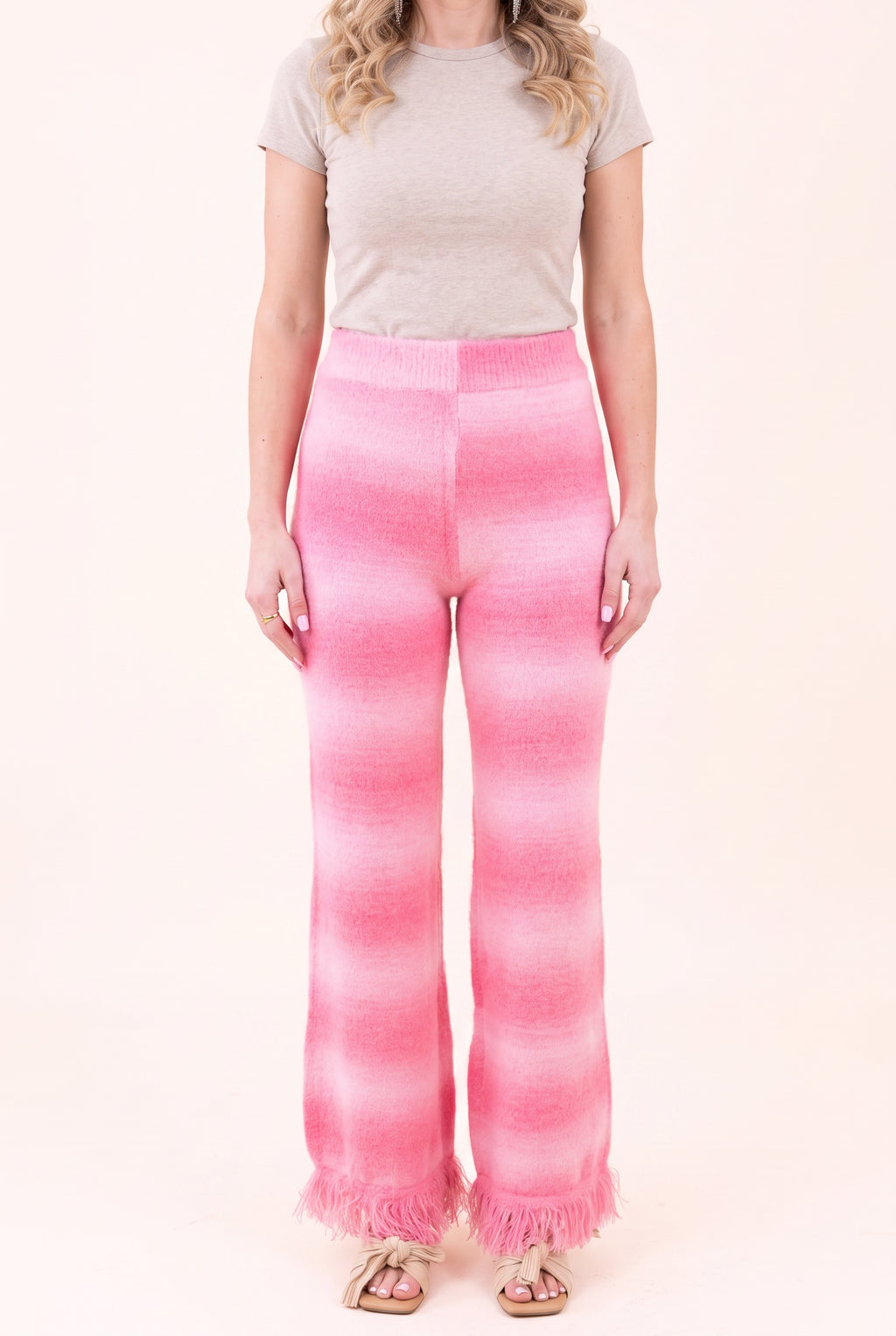 Softly Spoken pink ombré pants showing the full front fit, visible waist and long fringed hems.