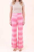 Softly Spoken pink ombré pants showing the full front fit, visible waist and long fringed hems.