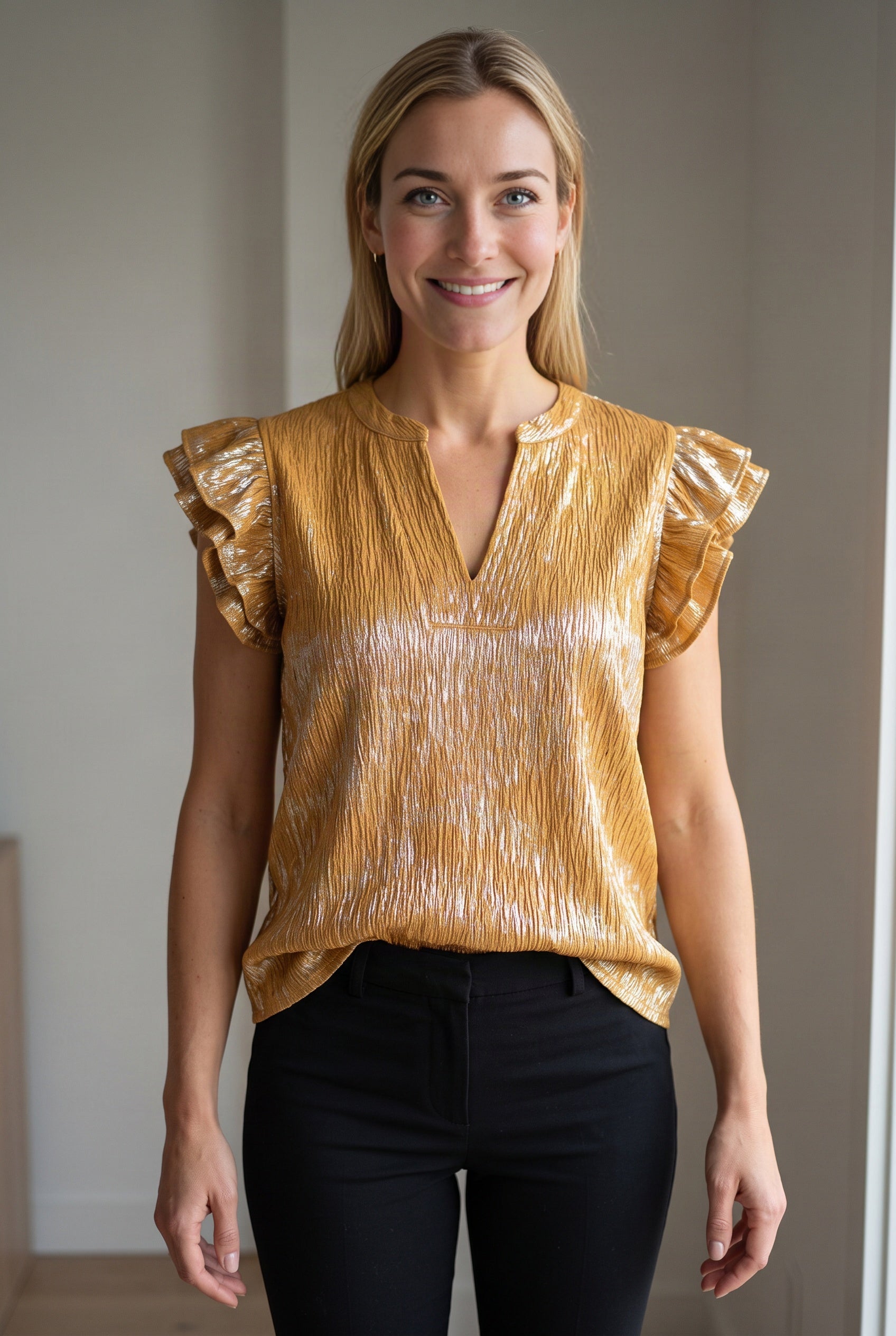 Mustard What Just Happened Ruffle Sleeve Top showing its relaxed front fit and hip-length hem.