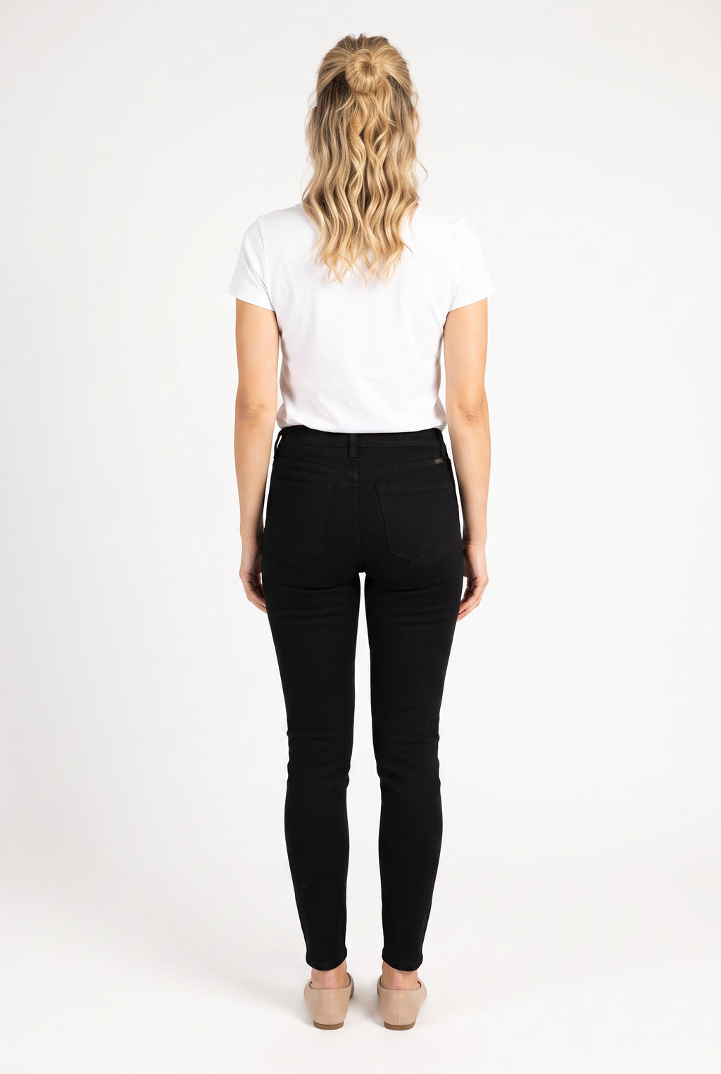 Full back view of Just Agree With Me black jeans showing the yoke, patch pockets and tapered legs.