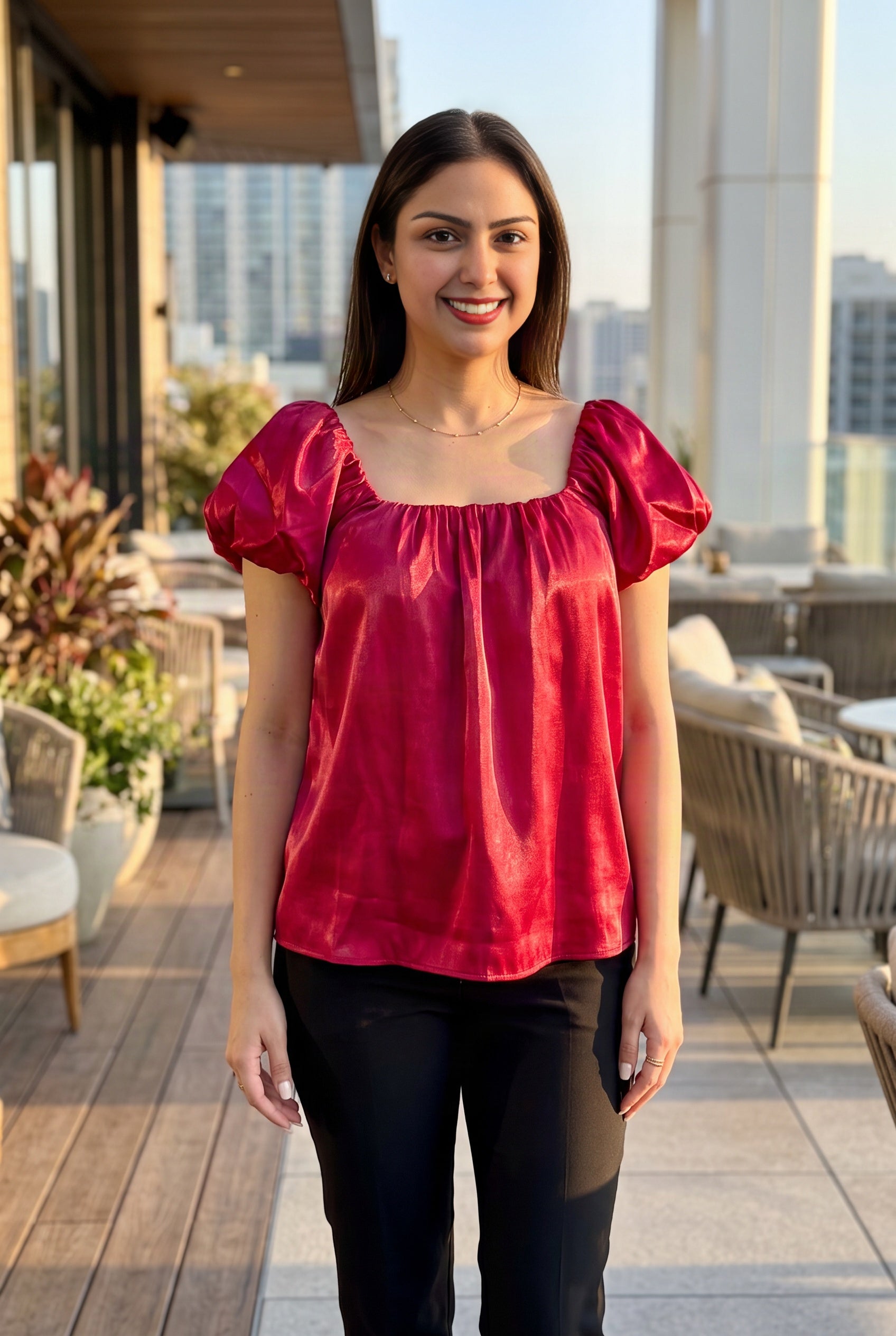 Red Until I Found Her satin top styled with black trousers for a bright date-night outfit.