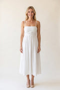 Love Actually White Pleated Midi Dress front view showing the square neckline and A-line fit.