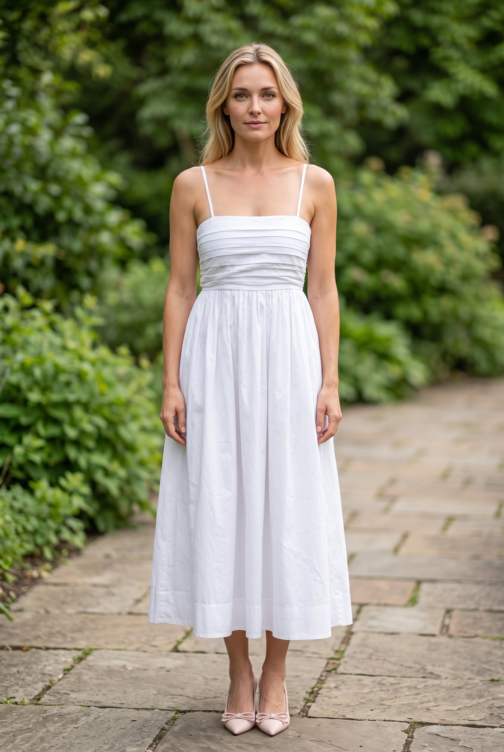 Love Actually White Pleated Midi Dress styled for a polished daytime garden event.