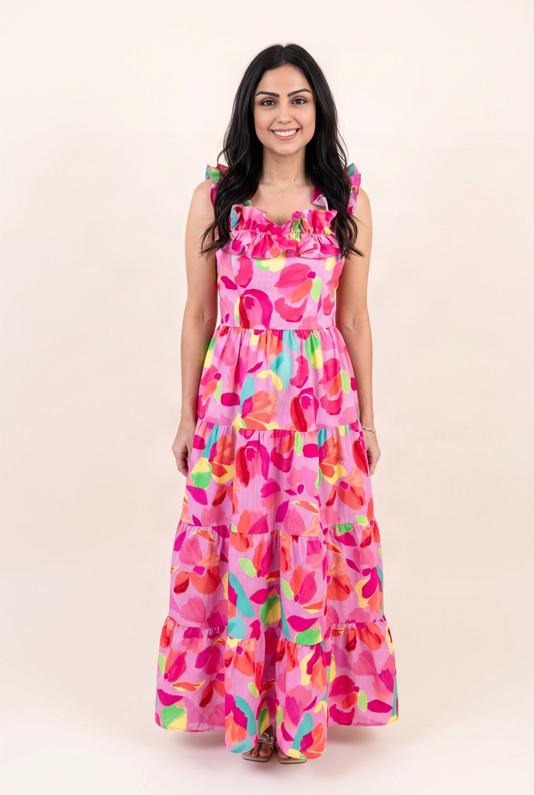 Front view of the Blooming Affair floral maxi dress showing its natural tiered silhouette and full length.