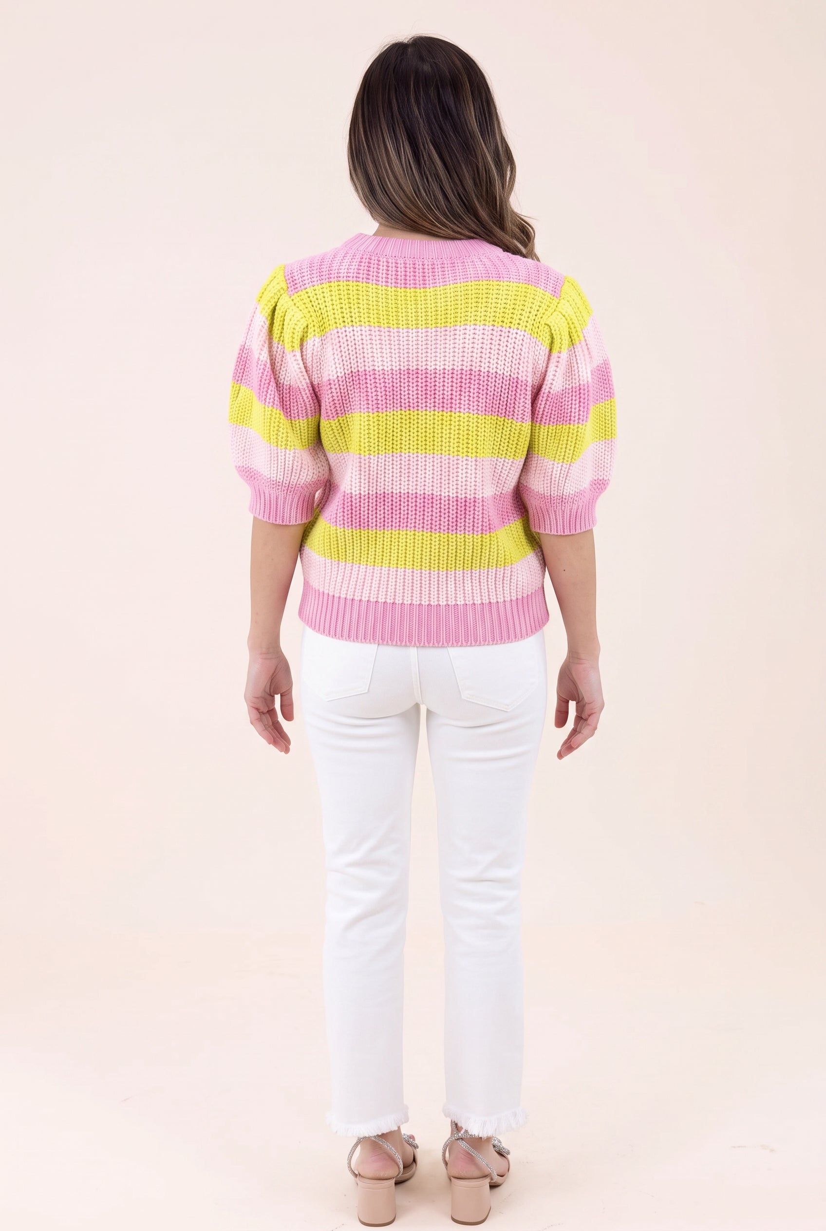 Back fit of the Share Your Story Sweater Top showing continuous stripes, puff shoulders, and ribbed hem.