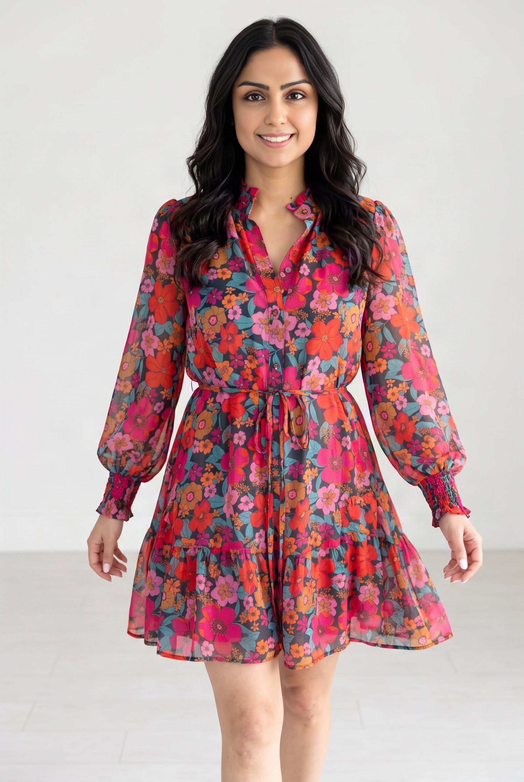 Shweta wearing the Only If You Knew Floral Dress in a bright studio, showing its color and skirt movement