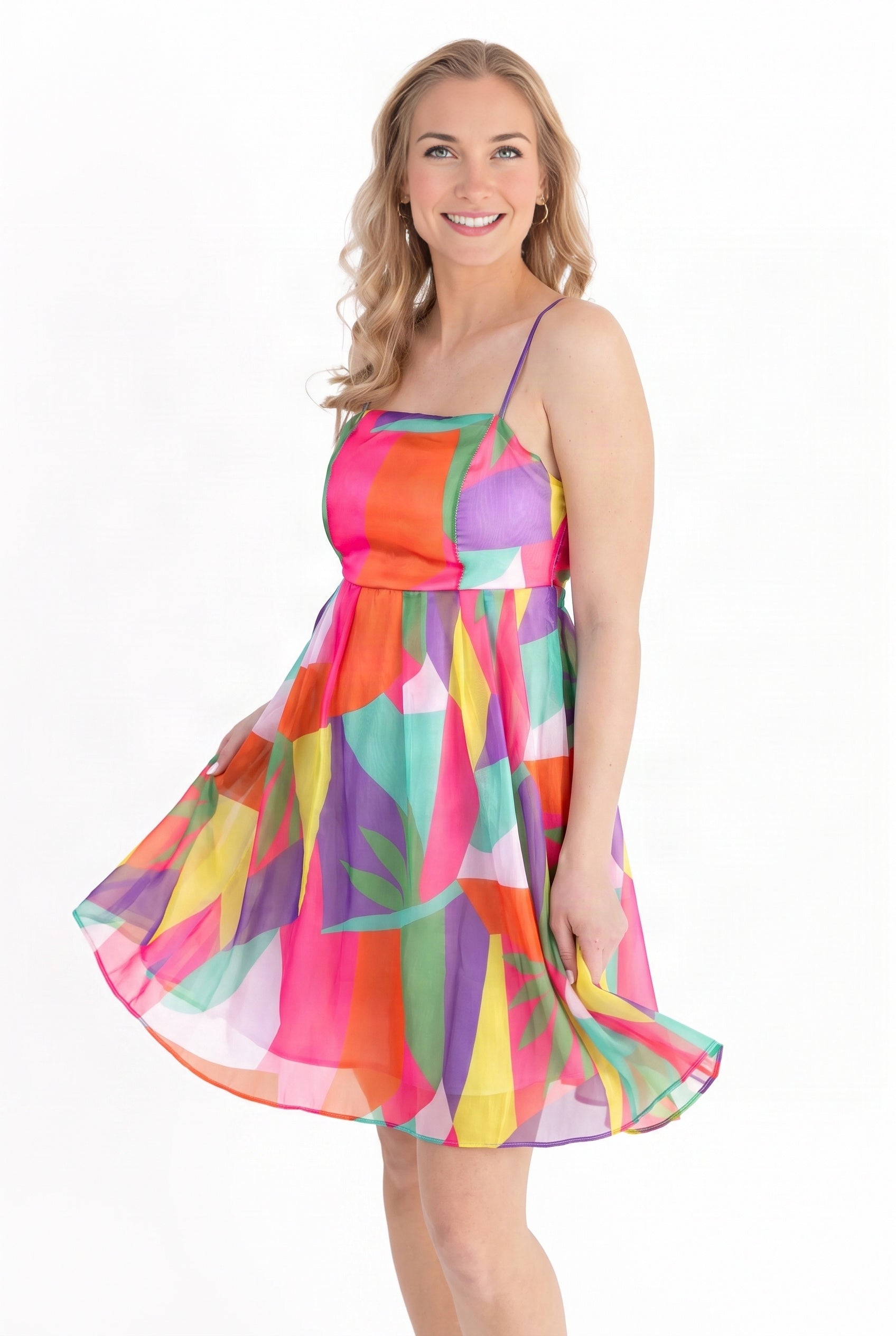 Fabric and finished hem of the Shore-ly Yours Tropical Mini Dress shown in daylight.