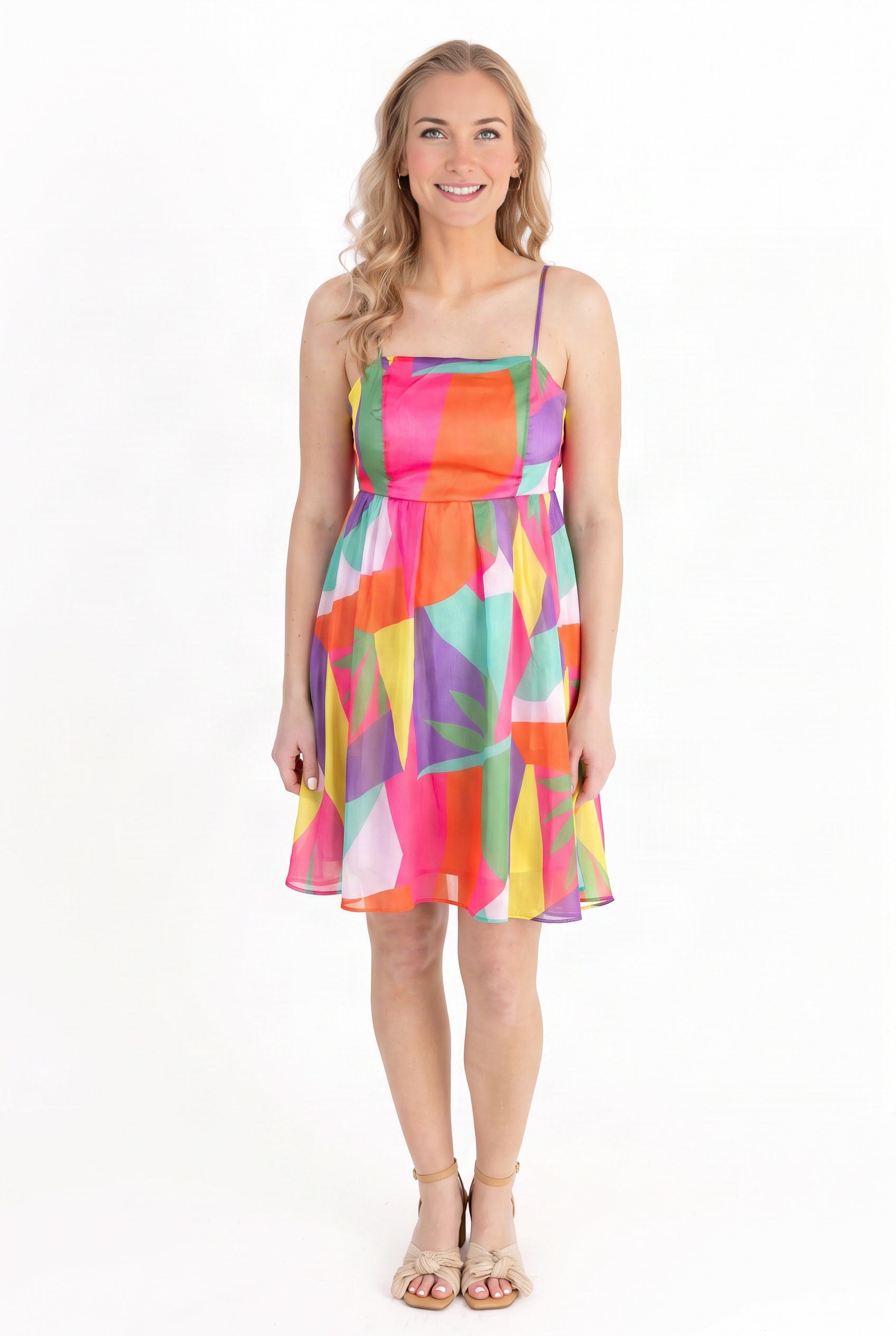 Straight-on fit of the Shore-ly Yours Tropical Mini Dress with its natural skater skirt.