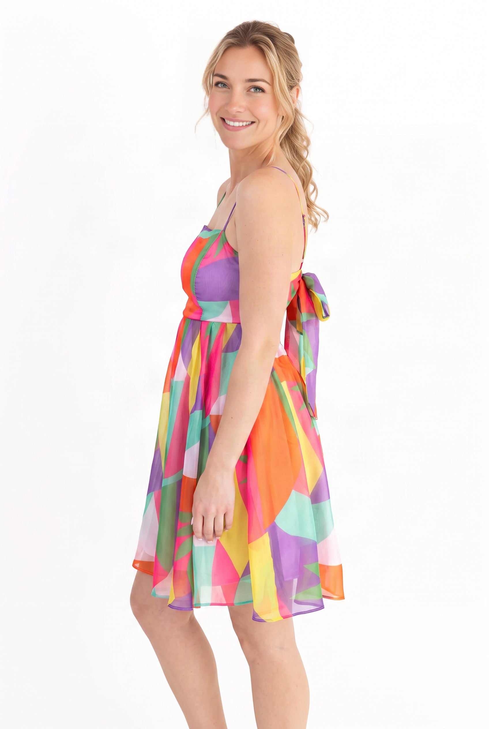 Angled side fit of the Shore-ly Yours Tropical Mini Dress showing its bodice and natural hem.