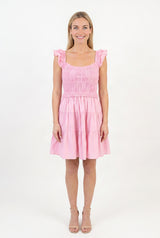 Front fit of the Completely In Tune pink crochet dress in Small, showing its square neck and tiered skirt.