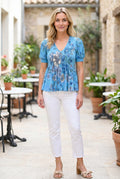 Wherever You Went V-Neck Pleated Top in Small showing the untucked front fit and flared hem.