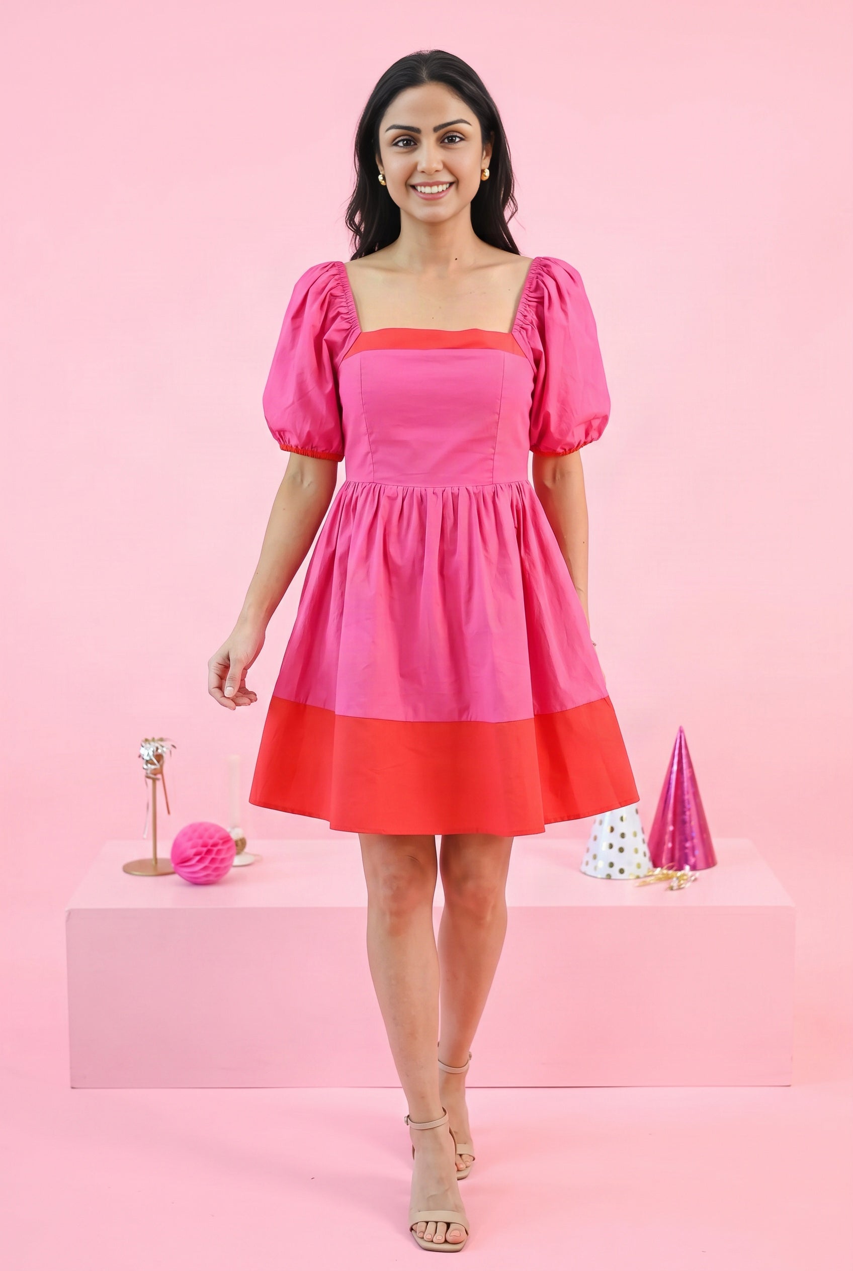 Shweta styles the Small magenta color block dress for a party with sandals and minimal earrings.