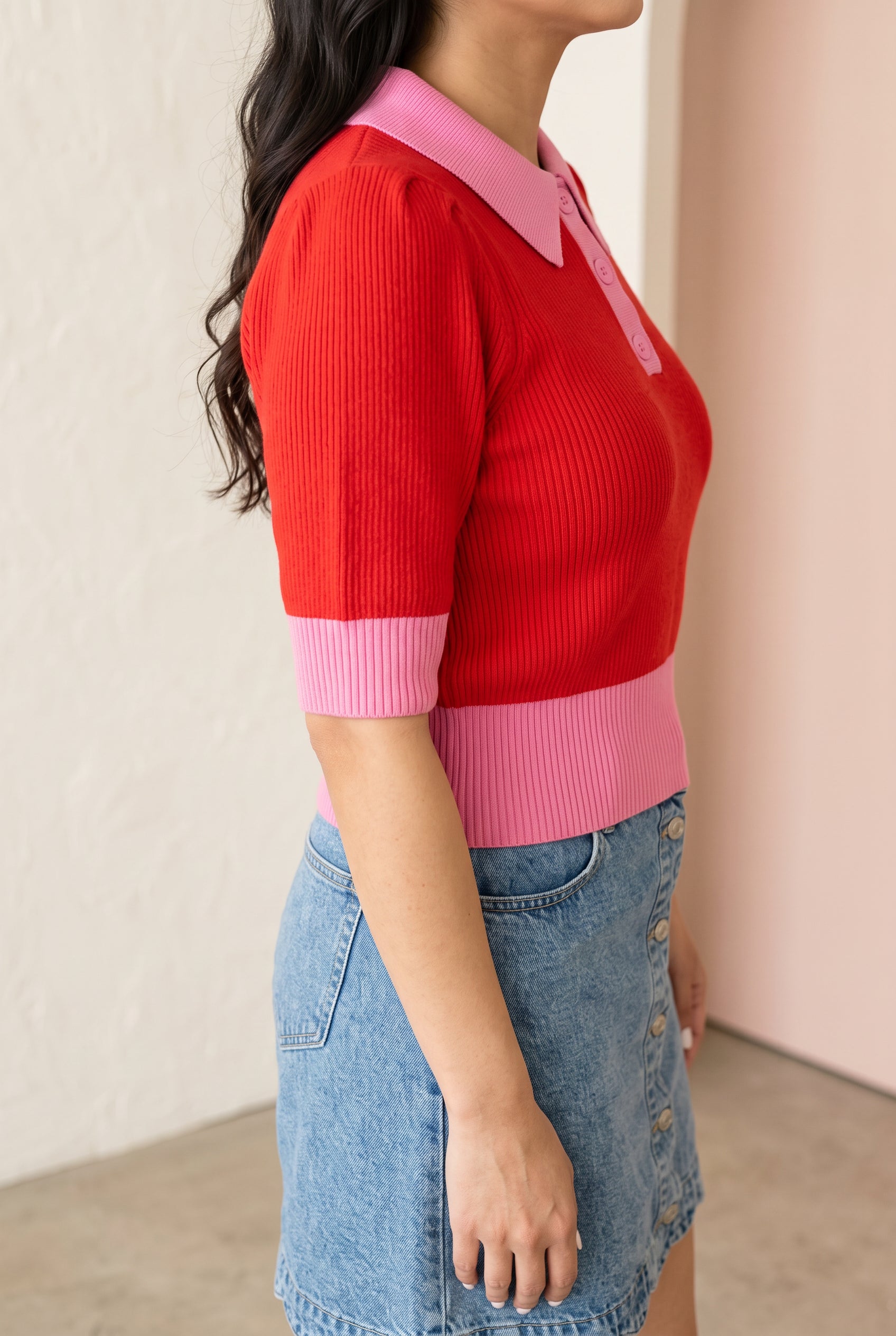 Angled side fit of the Small sweater showing its puffed sleeve, fitted body, cuff, and waistband.