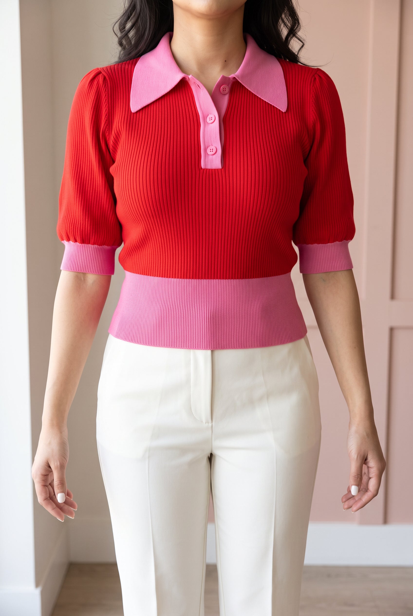 Front fit of the red and pink collared sweater in Small with the full waistband visible.