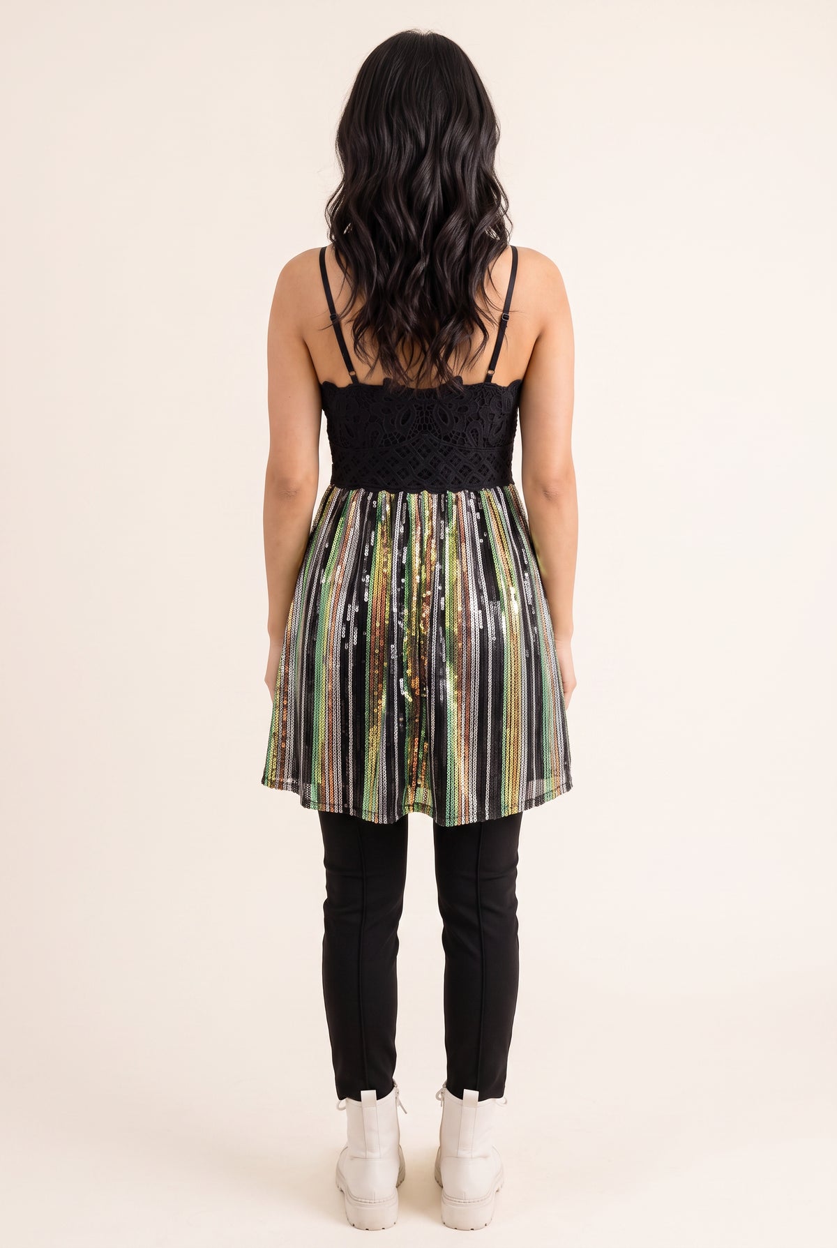 Front fit of the Small sequin tunic top showing its V-neck, flared hem and upper-thigh length.
