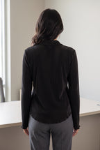 Small Black Rolling in the Deep Pleated Top styled untucked with tailored grey trousers for work.