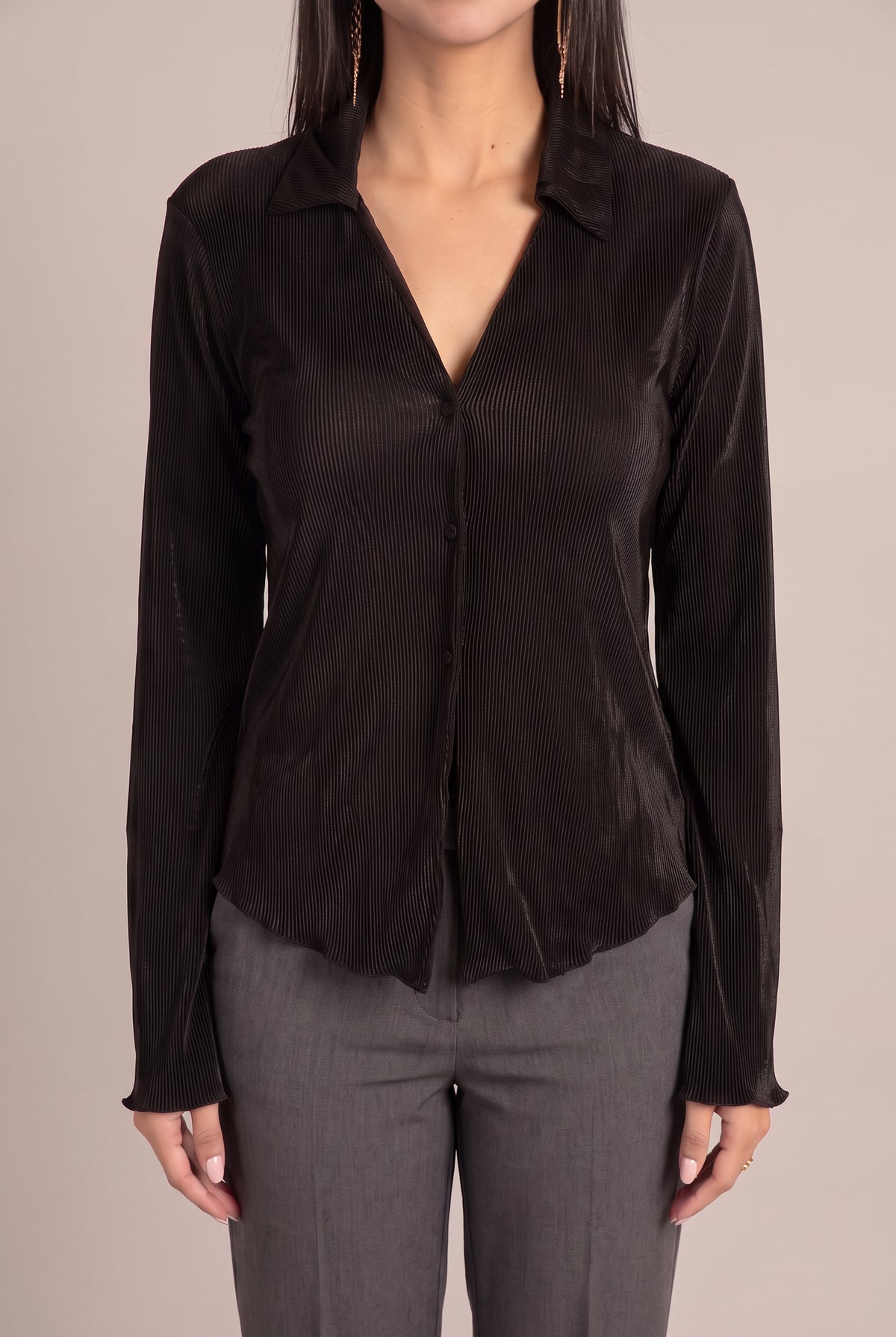 Front fit of the Rolling in the Deep Pleated Top in Small Black, showing its V-neck and relaxed pleated shape.