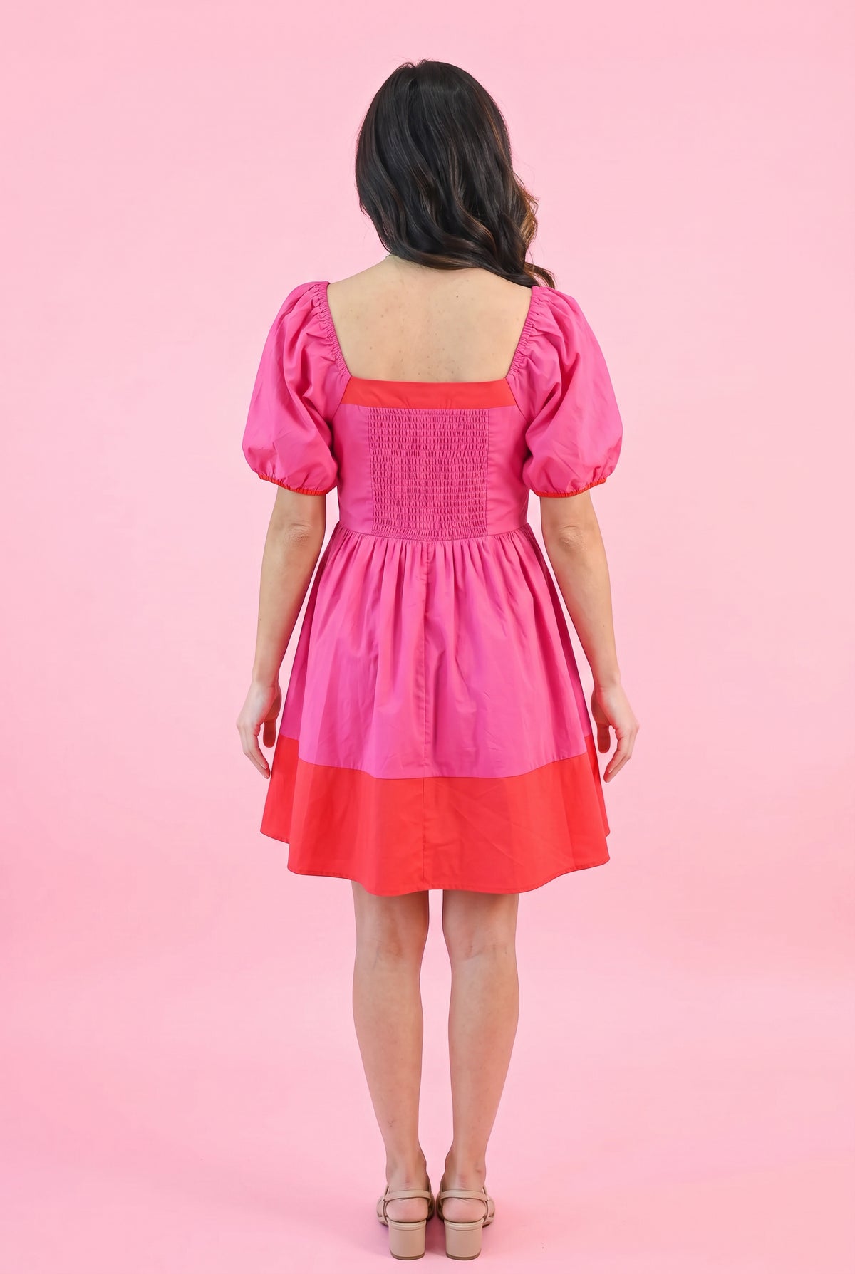 Back fit of the Small Magenta color block dress showing the square back, shirring and gathered waist.
