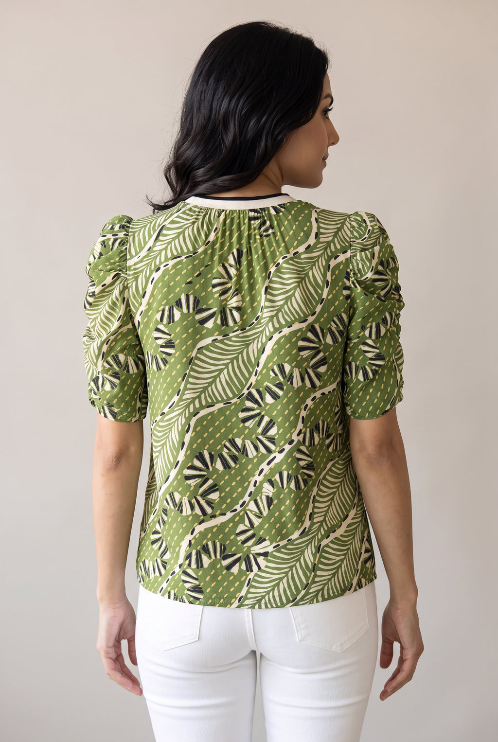 Front fit of the Young Wild and Free Puff Sleeve Top in Small showing its relaxed body and puff sleeves.