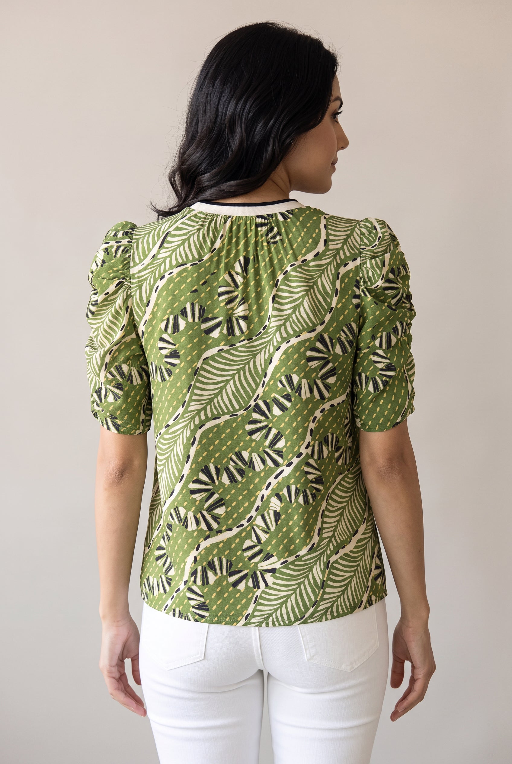 Front fit of the Young Wild and Free Puff Sleeve Top in Small showing its relaxed body and puff sleeves.