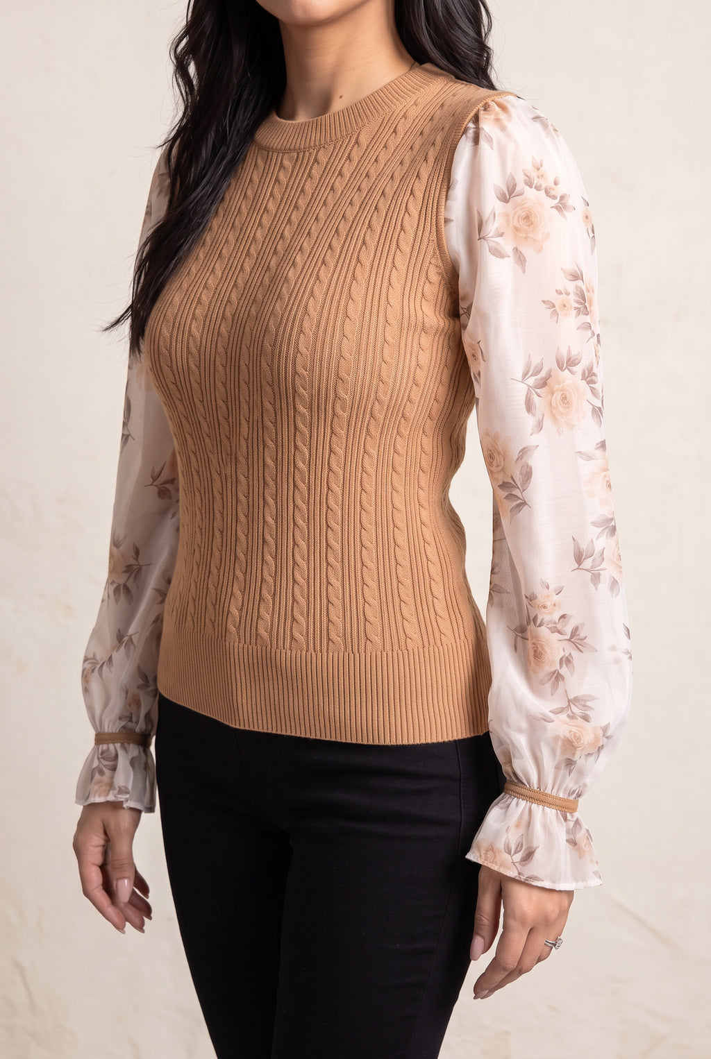 Angled side fit of the Wanna Be With You Knit Sweater Top showing waist shape and sleeve volume.