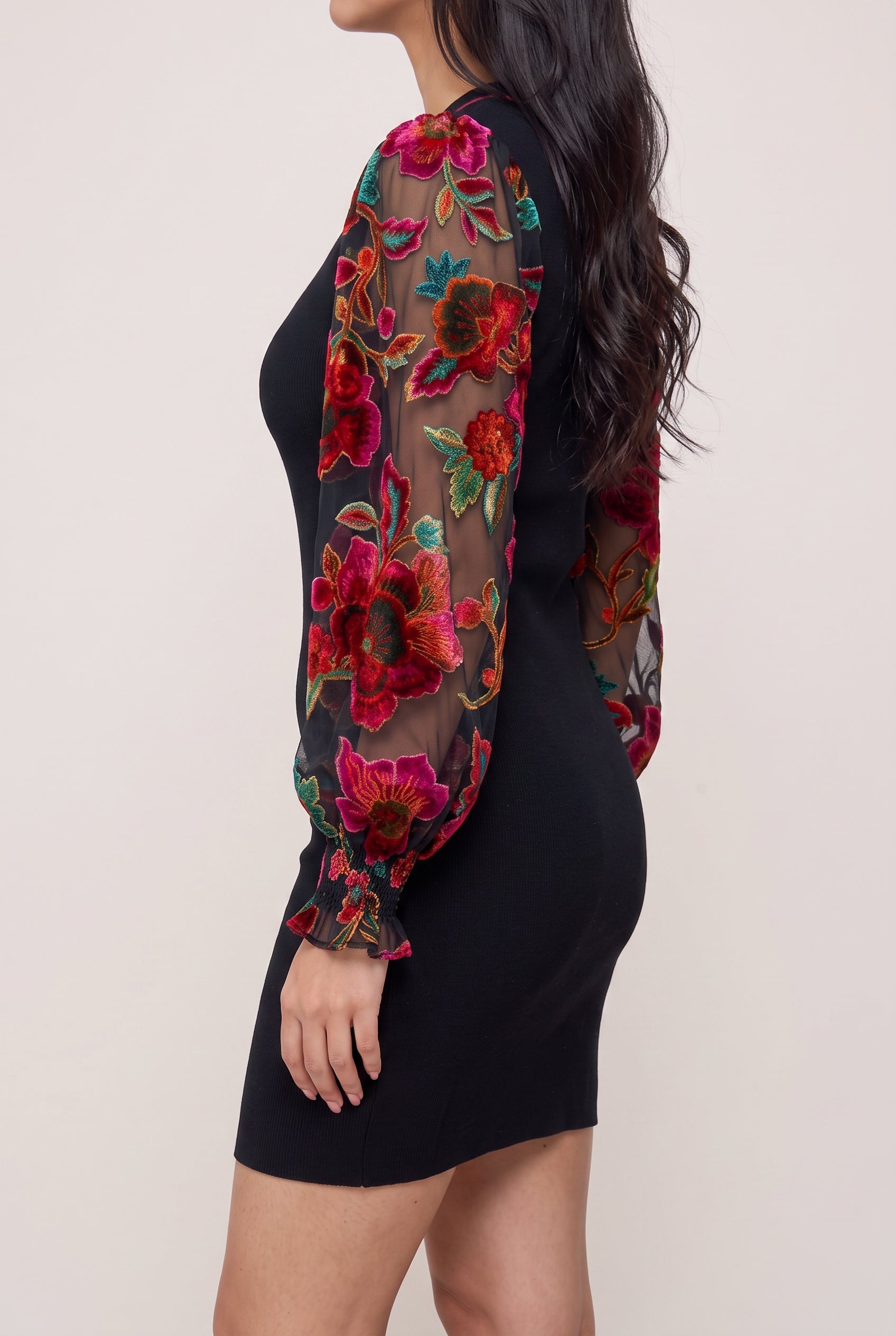 Angled side fit of You're My Favorite Sweater Dress showing its close silhouette and ballooned sheer sleeve.