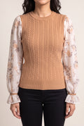 Front fit of the Wanna Be With You Knit Sweater Top showing its untucked length and balloon sleeves.