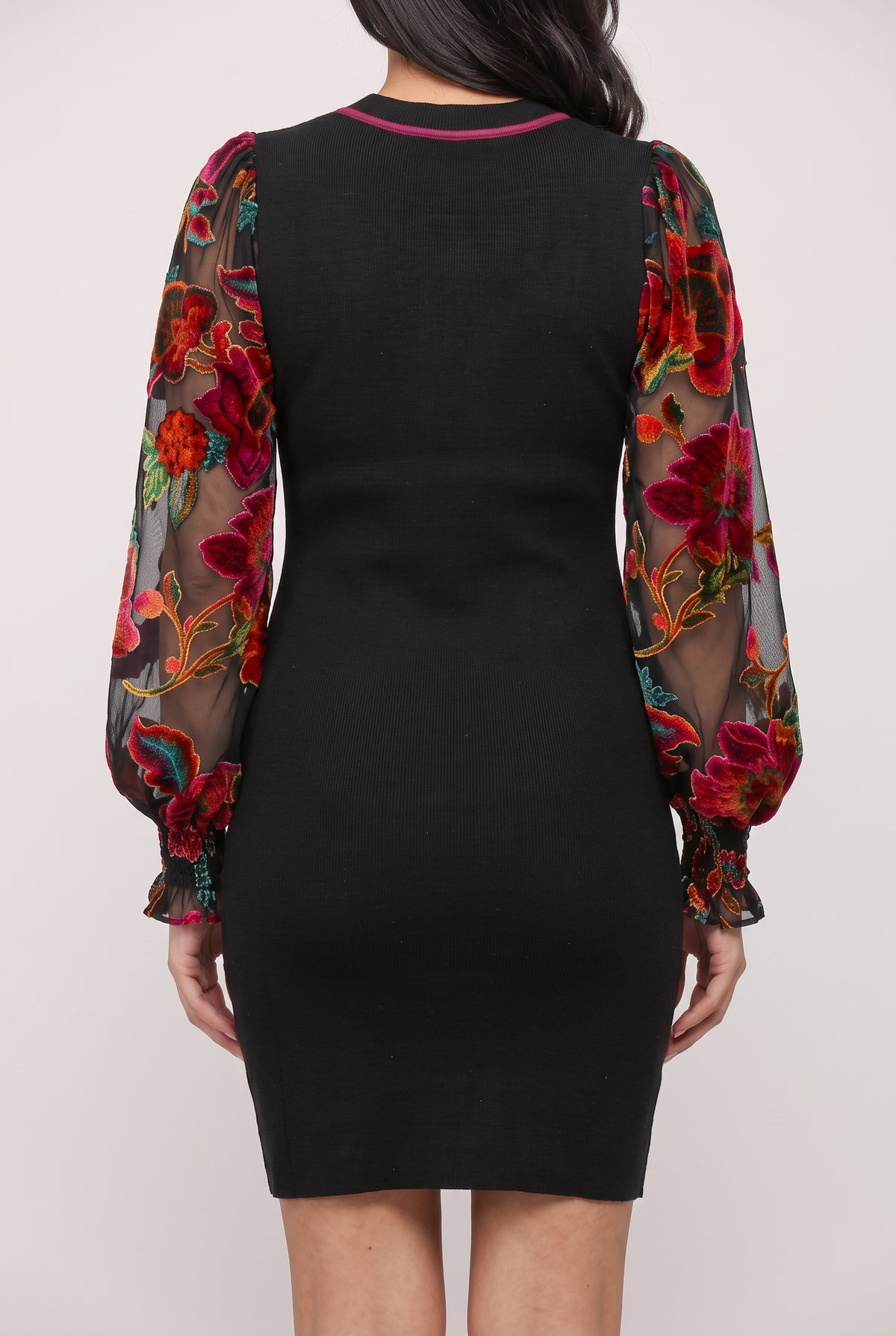 Back fit of You're My Favorite Sweater Dress in Small, showing the plain rib-knit body and embroidered sleeves.