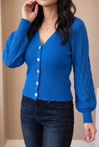 Tell Me About It Sweater Top during an arm lift, showing sleeve fall and movement at the waist.