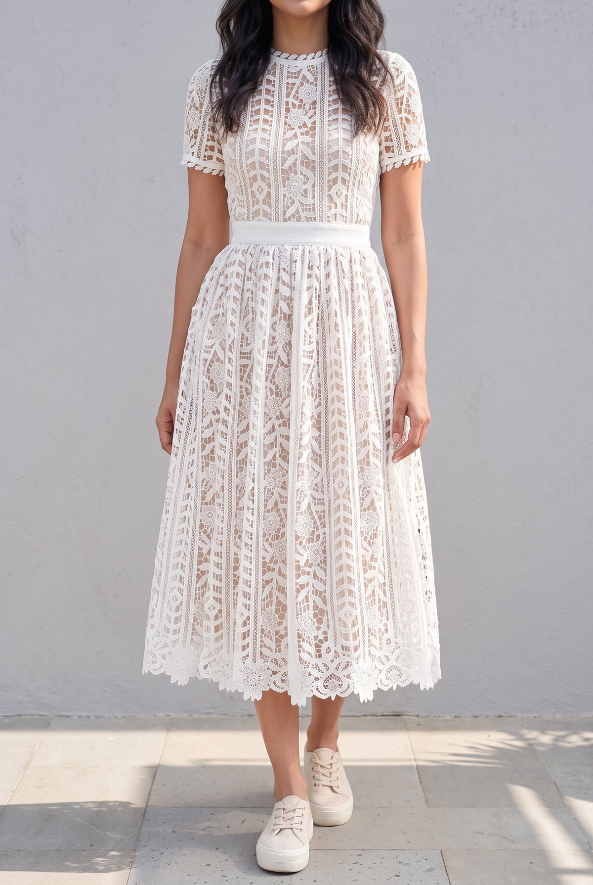 Close view of Sunset Stroll white lace midi dress showing floral lace, sheer sleeve and lined bodice.