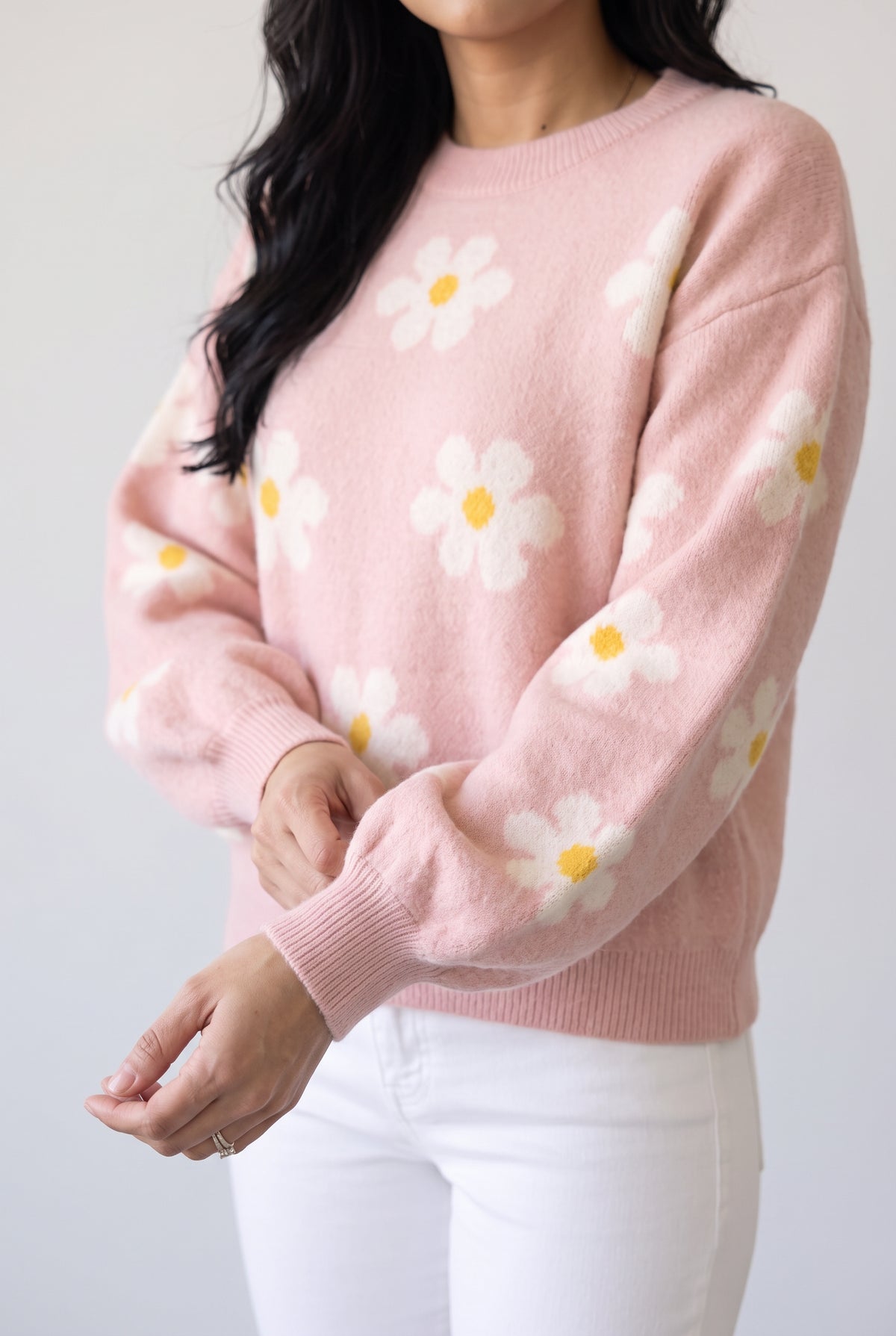 Ribbed cuff and gathered balloon sleeve on the Let's Just Stay Floral Sweater after a gentle hand release.