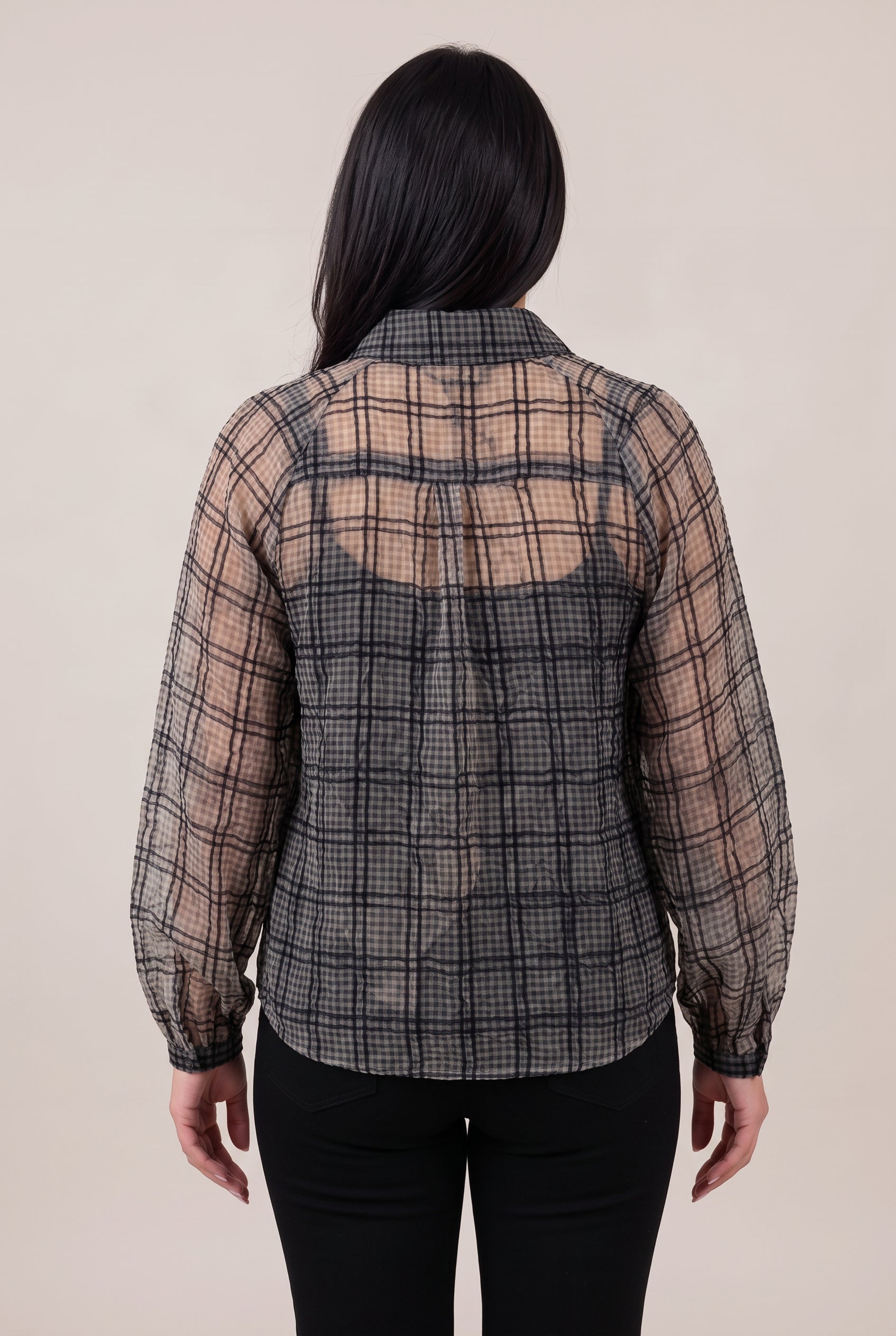 Straight back of the Just Looking sheer plaid blouse showing its yoke, gathered volume and rear hem.
