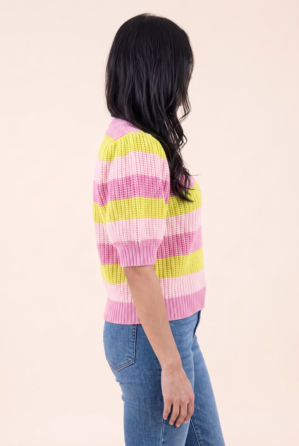 Angled side fit of Share Your Story Sweater Top in Small showing the sculpted puff sleeve.
